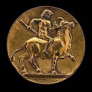 A Youth Riding on a Bull