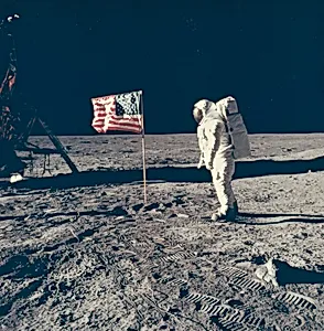 Buzz Aldrin Poses with Flag