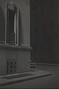 Car behind building