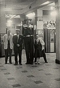 Charlie Lucas with giant Buck Nolan, lady midget Margharita and others, Hubert's Museum, N.Y.C. 1959