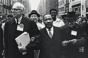 Dr. Benjamin Spock, Dr. Martin Luther King, Jr., and Monsignor Rice of Pittsburgh march in the Solidarity Day Parade at the United Nations Building