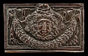 End panel of a writing casket: Medusa Head, Garland, and Bucrania