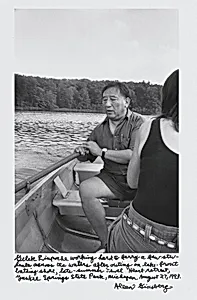 Gelek Rimpoche working hard to ferry a few students across the waters after outing on lake-front bathing shore, late-summer Jewel Heart retreat, Yankee Springs State Park, Michigan August 27, 1993.