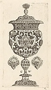 Goblet, rim decorated with masque with  gaping mouth