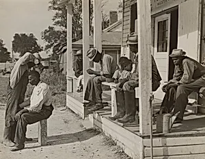 Haircut in Front of General Store and Post Office on Marcella Plantation, Mileston, Mississippi