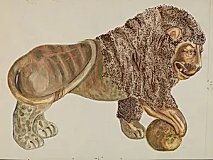 Lion and Ball Figurine