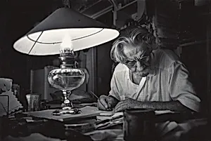 Long after the Hospital Is Asleep, Schweitzer Works at His Desk