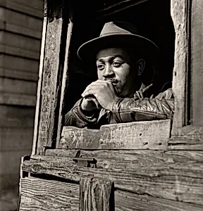 Man at Window of Shack, Chicago, Illinois