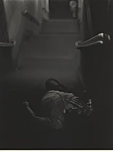 Man lying down, subway steps