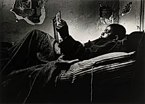 Norman Jr. Reading in Bed