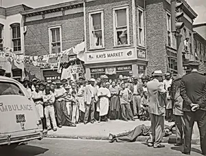 Passersby Watch Police and Ambulance Attendants after Edward White was Killed Yesterday