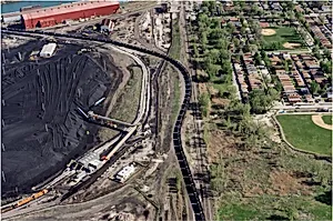 Petcoke filled train snaking through the neighborhood, Southeast Side, Chicago, IL