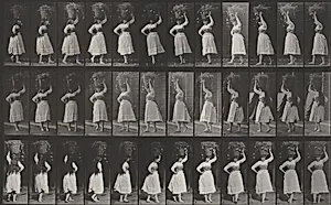 Plate Number 57. Walking and turning around with a 10-lb. basket on head by Eadweard Muybridge
