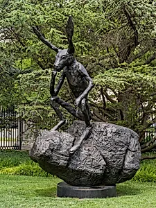 Thinker on a Rock