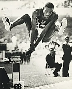 Title from caption on object: “Bob Beamon Sets New World Record in Olympic Broad Jump”