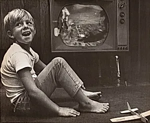 Title from caption on object: "Watches Dad at Work”