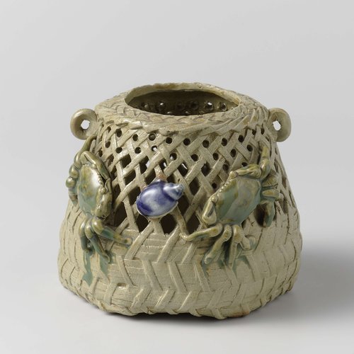 Pierced jar in the shape of a basket with two crabs and a conch by anonymous
