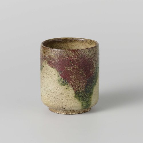 Teabowl with a red, green and cream glaze