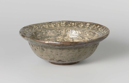 Bowl with a flower roundel and ornamental borders by anonymous; anonymous