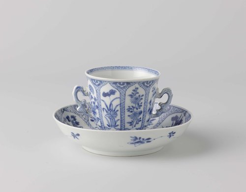 Cup and saucer with flower sprays in a panel decoration by anonymous