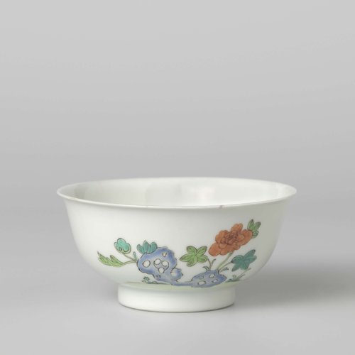 Bell-shaped bowl with flower sprays and a flowering plant near a rock by anonymous