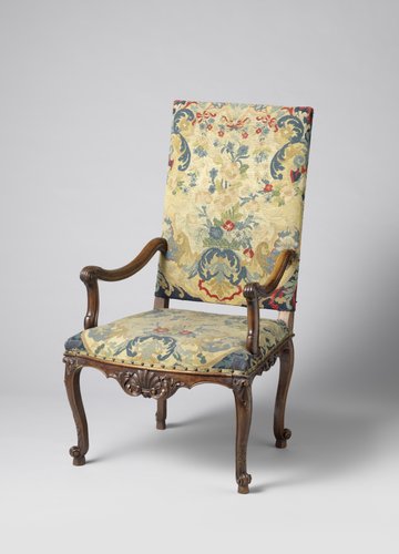 Armstoel van notenhout met petit-point bekleding by anonymous