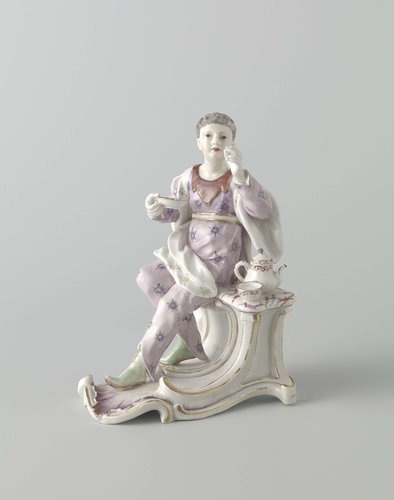 Figure of a seated womand with tea