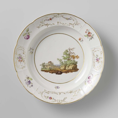 Plate with a landscape and flower sprays in panels