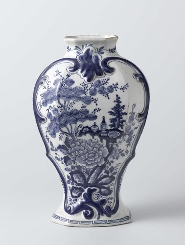 Two beaker vases and a vase, part of a garniture