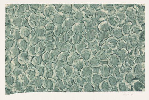 Gestreken stijfselverfpapier in groen met ingekraste lijnen en ingedrukt wielmotief by anonymous