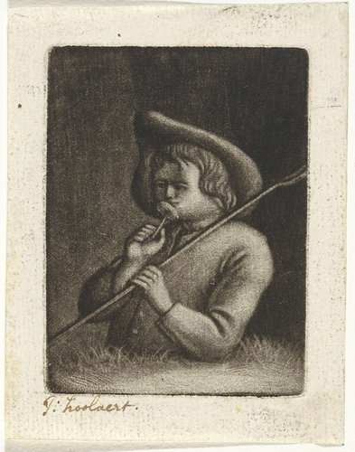 Een jongen ruikt aan een bloem