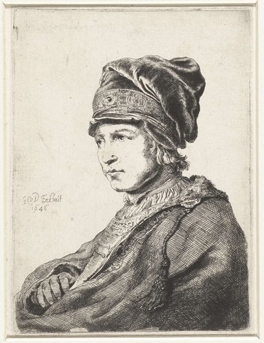 Portret van een jongeman met muts