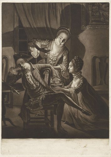 Twee vrouwen houden de hand van een slapende man in het water