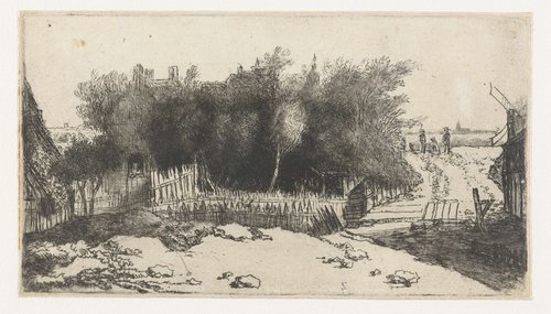 Landschap met een wit hek