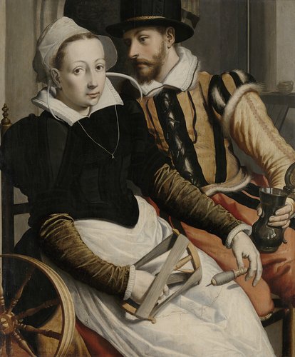 Man en vrouw bij een spinnewiel