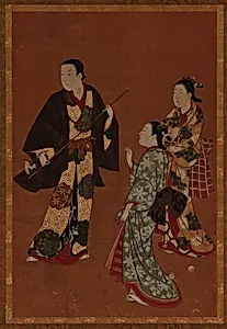 A man, possibly an actor, and two girls