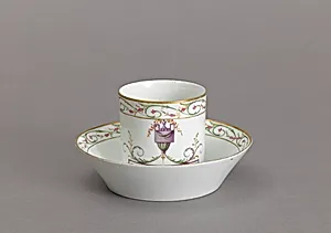 Cup and Saucer with Urn Pattern