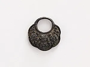 Garment ornament ((one of pair, F1917.575-576) by Unknown