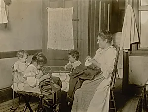 N.Y. tenement. Little ones helped in homework.