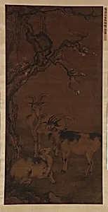 Three goats under a flowering plum tree