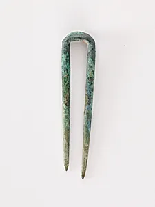 Topknot pin by Unknown