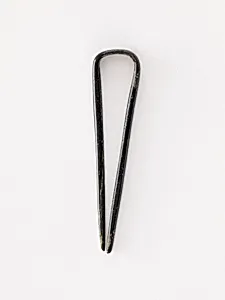 Topknot pin by Unknown