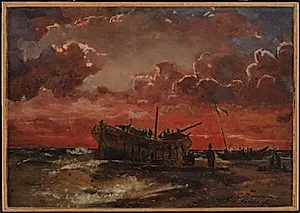 Et vrag på Jyllands vestkyst ved solnedgang