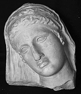 Gravrelief. Kvindehoved by Ubekendt