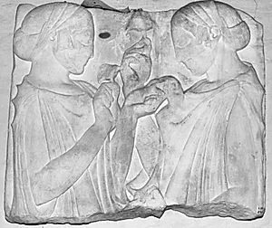 Gravrelief. To kvinder i profil mod hinanden med blomster i hænderne by Ubekendt