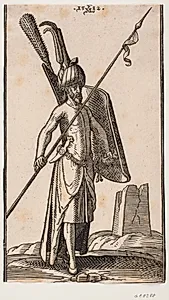 Stående soldat med krumt skjold i v. hånd og i h. hånd et spyd, der holdes skråt; sværd ved hans v. side, en dolk stukket i bæltet ved hans v. side; i baggrunden t.h. ruinen af en obelisk eller et tårn med kvadratisk grundplan by Melchior Lorck