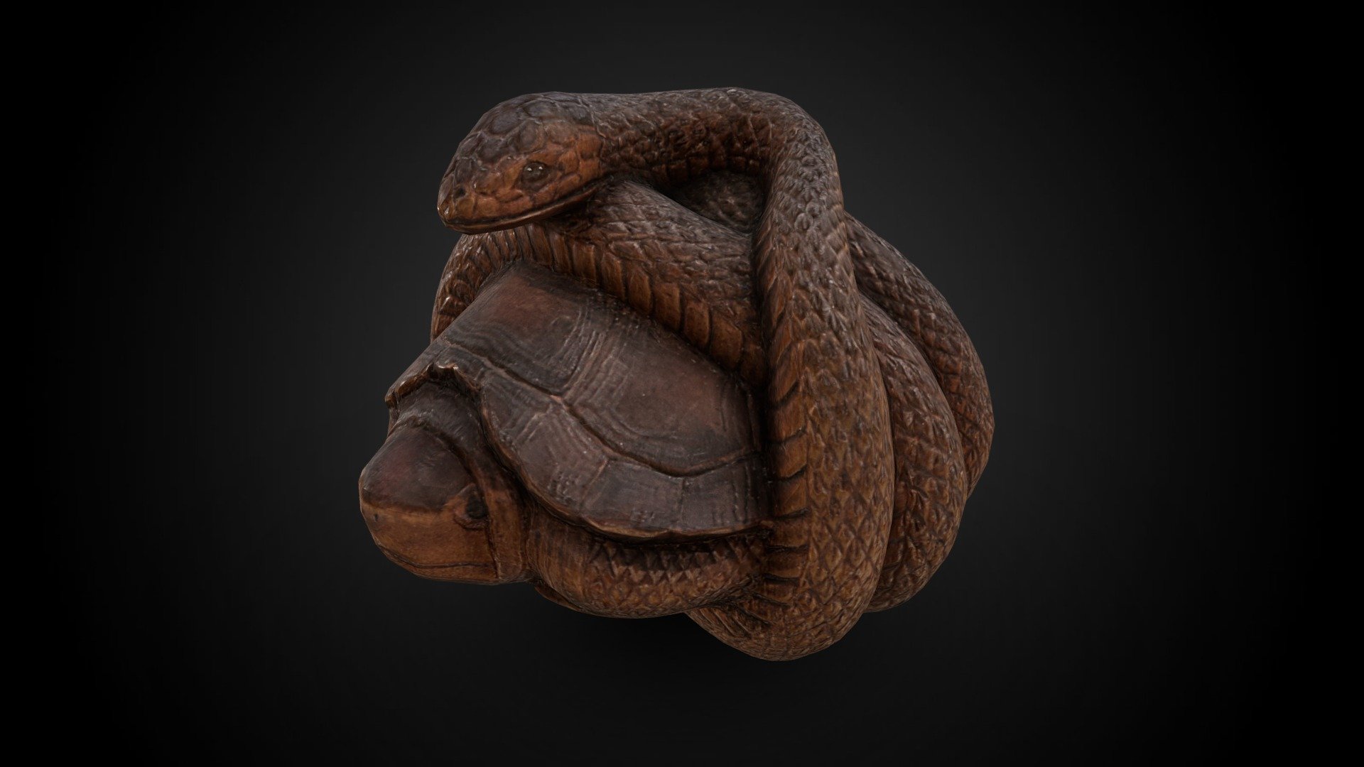 Netsuke - Snake curled around a turtle