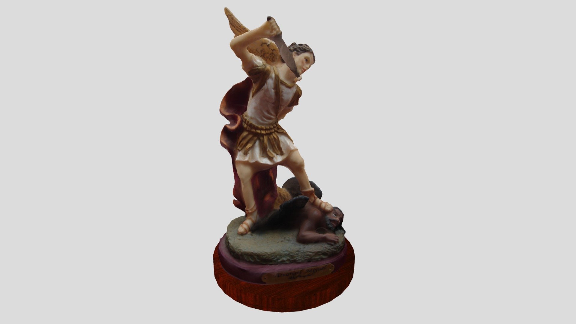 Figurine of Archangel Michael treading the devil