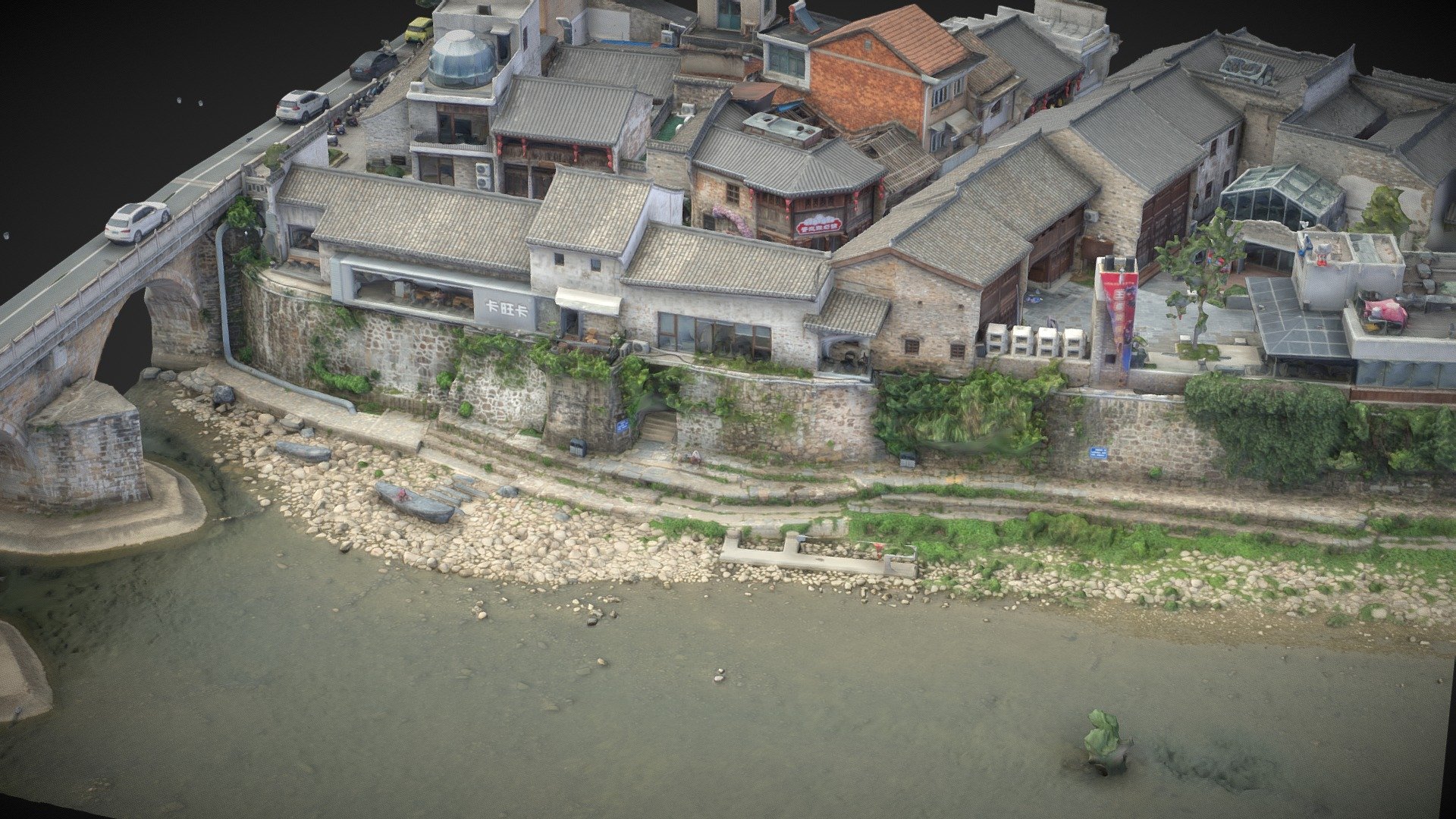 Residential buildings by the river and bridge
