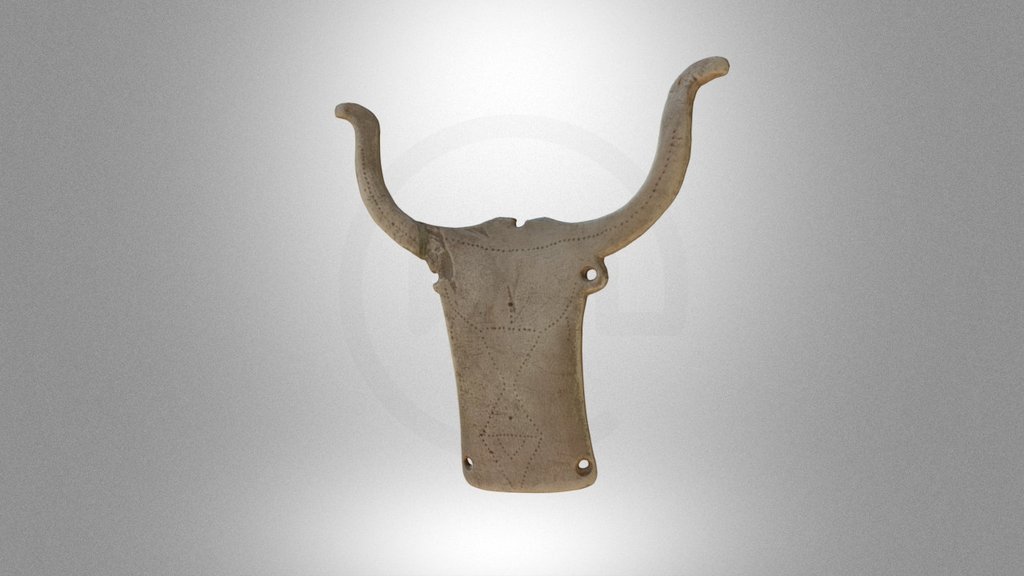 Bone plaque in the shape of a bull’s head